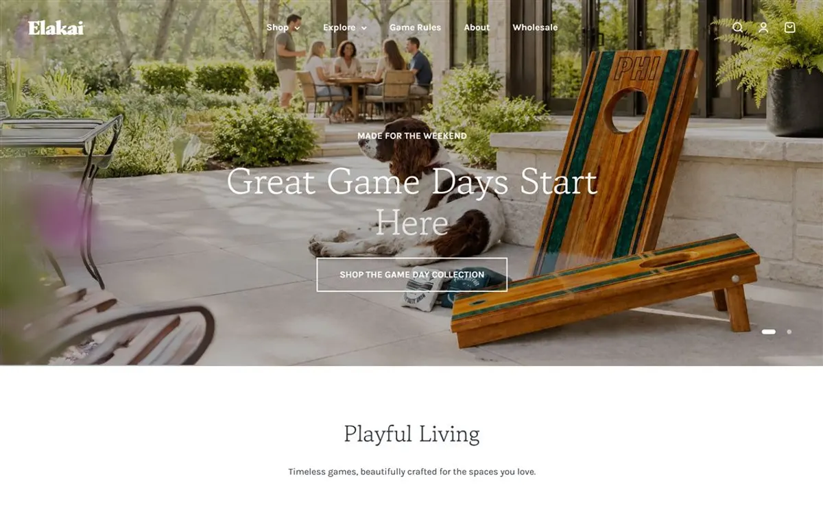 Elakai Outdoor storefront showing artisan cornhole boards in a garden.